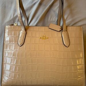 Brand new w/tags Coach purse. Retails for $578. Asking $350